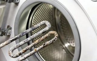 Cum se curăță o mașină de spălat cu oțet