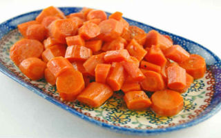 Hvorfor kogte gulerødder er nyttige, og hvor mange kalorier der er i dem